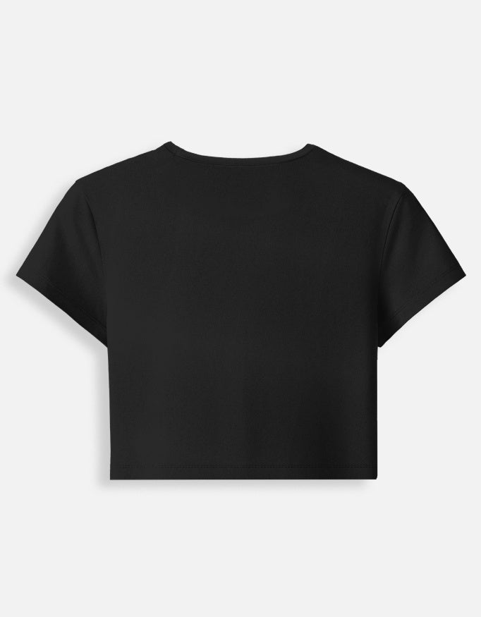 Women’s fitted crop baby tee in black, plain back view without graphic