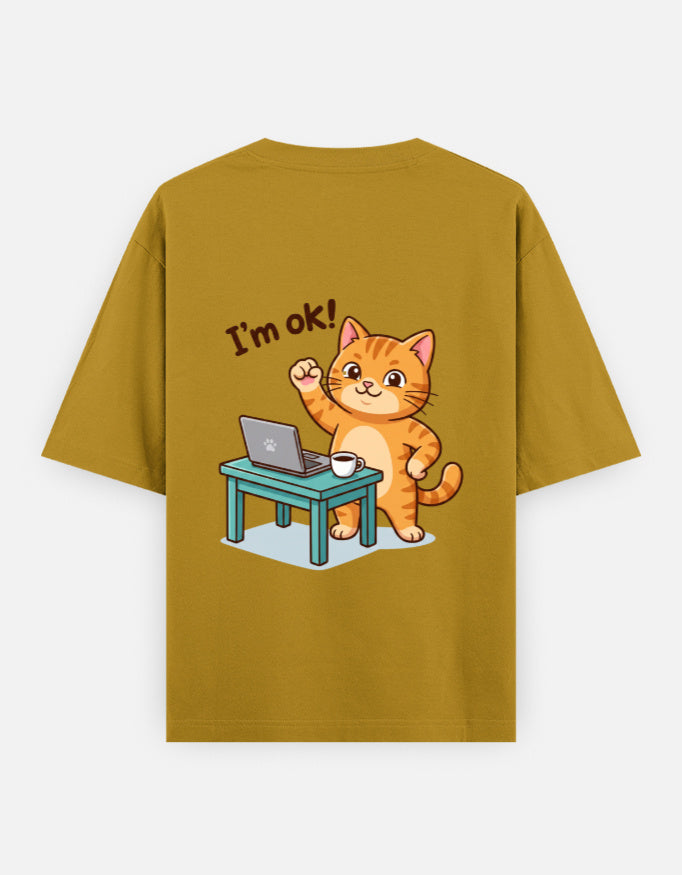 Mustard yellow oversized round-neck T-shirt with “I’m ok!” orange cat desk graphic