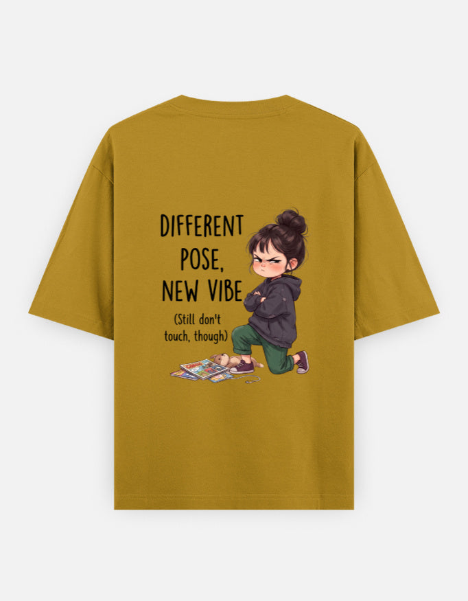 Mustard yellow unisex oversized round-neck T-shirt, back graphic: child and 'Different Pose, New Vibe'.