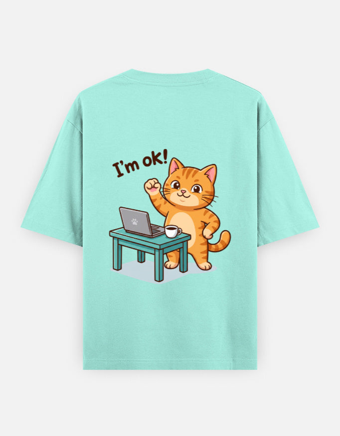 Mint oversized round-neck T-shirt with “I’m ok!” orange cat desk graphic