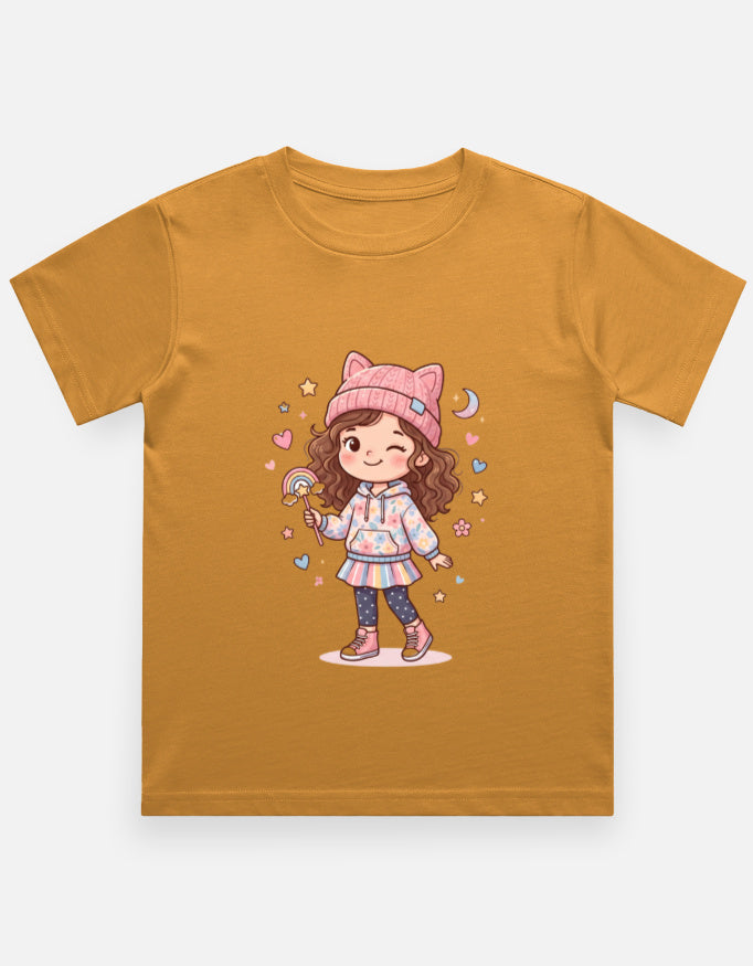 Kids girl’s graphic crew neck T-shirt, tan with cartoon girl illustration on front.