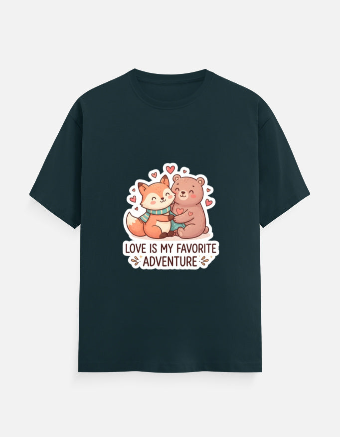 Unisex crew neck T-shirt in dark teal with cartoon bear graphic, hearts, and 'Love is my favorite adventure'