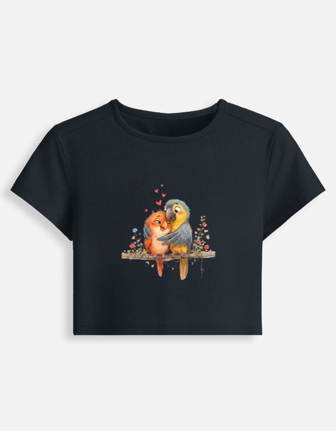 Women’s dark navy fitted crop baby tee with colorful bird graphic on the front