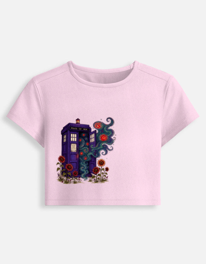 Women's fitted crop baby tee, light baby pink front with colorful house graphic