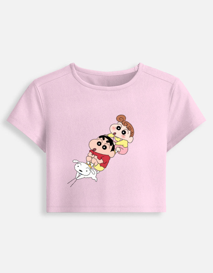 Women's fitted crop baby tee, light pink with cartoon character graphic on front