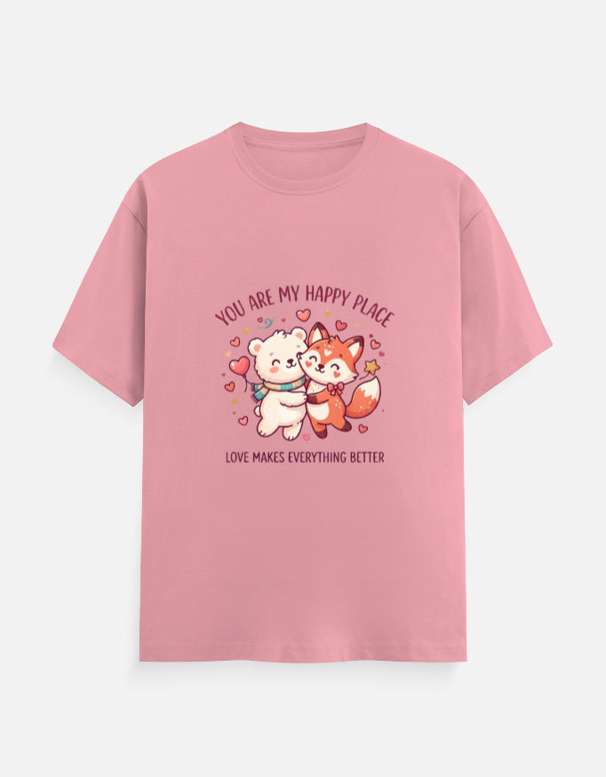 Pink unisex crew-neck tee with 'happy place' cartoon graphic on front.