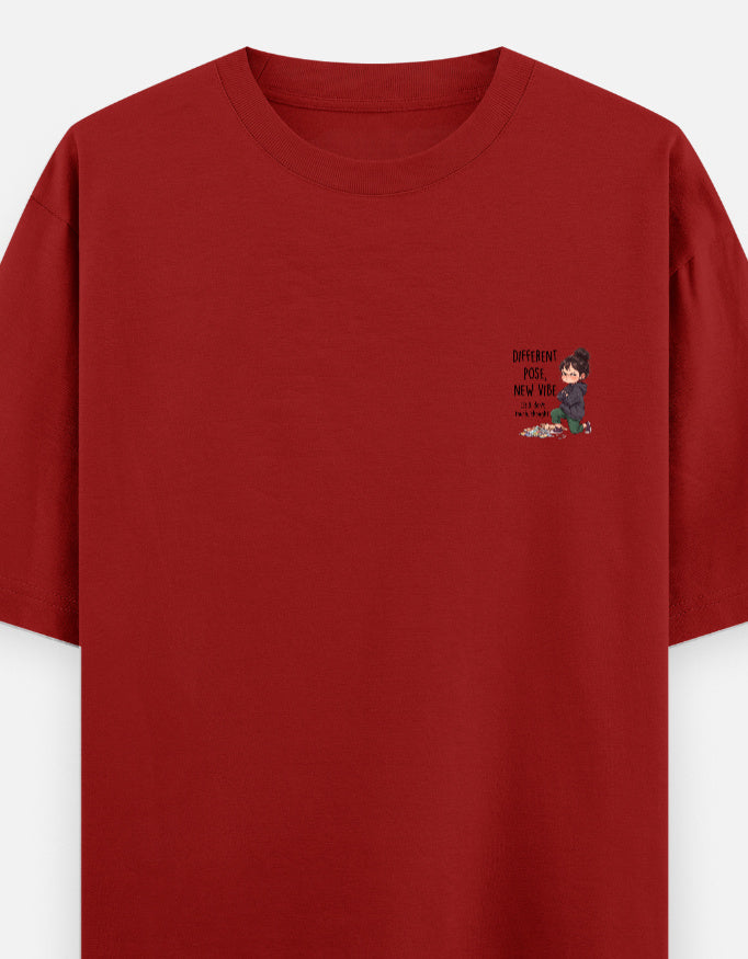 Unisex graphic oversized round-neck T-shirt in red with small chest print.