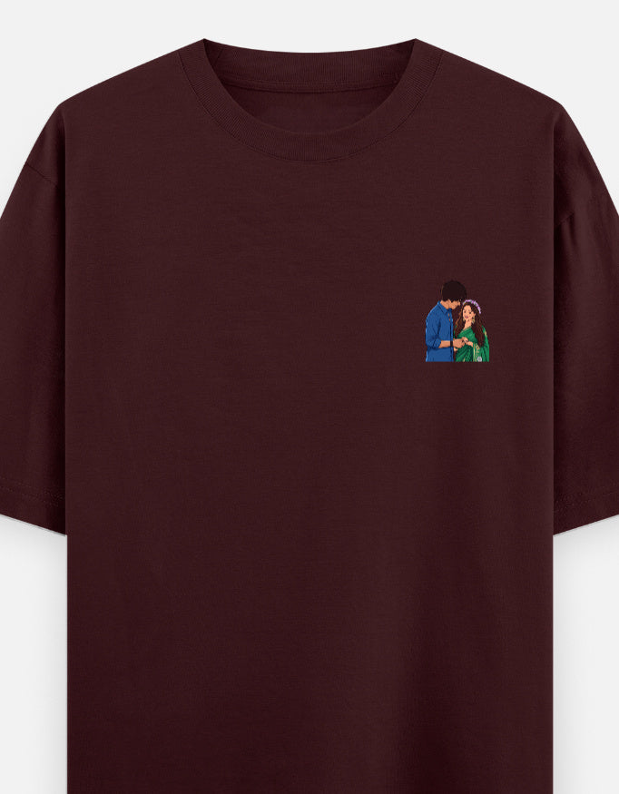 Unisex oversized crewneck T-shirt, maroon, with small couple graphic on chest.