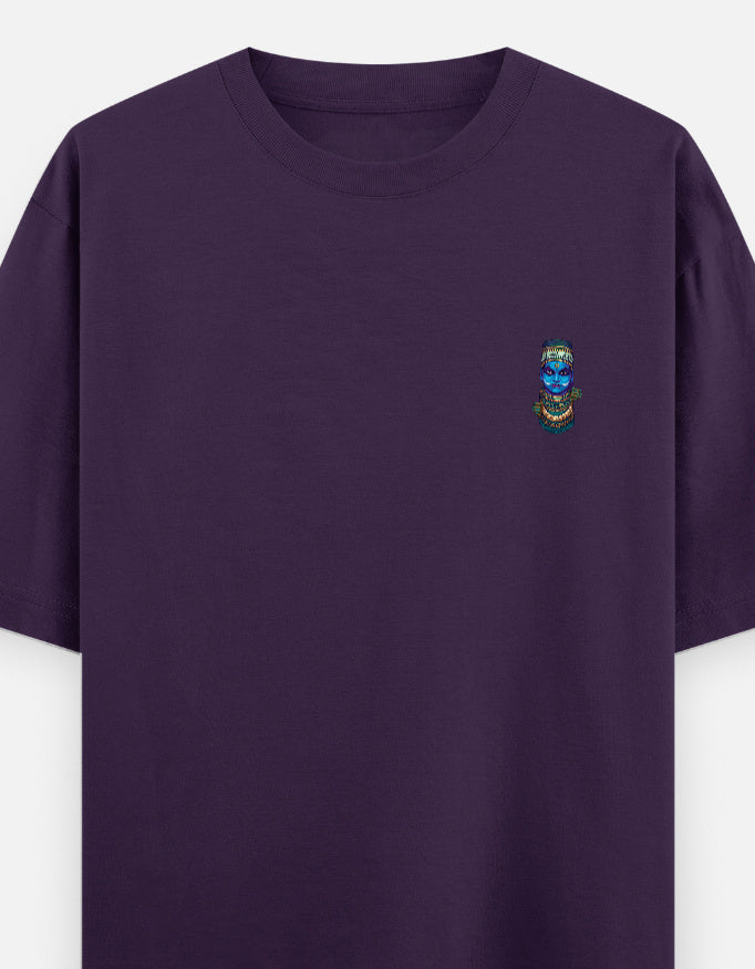Purple unisex oversized round-neck T-shirt with small colorful face graphic on chest