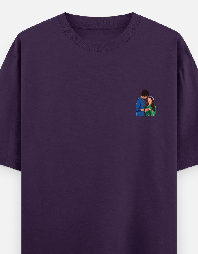 Unisex oversized crewneck T-shirt, purple, with small couple graphic on chest.
