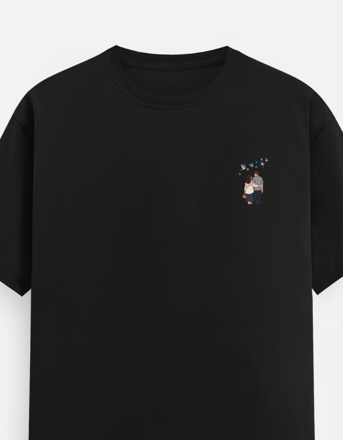 Unisex crew-neck t-shirt, black, small pixel couple graphic on chest