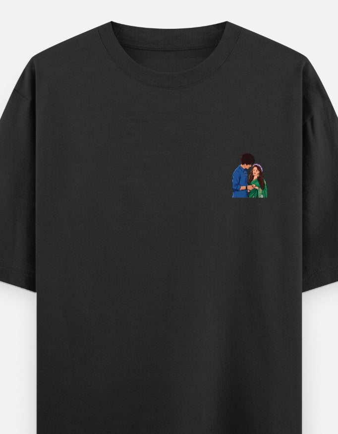 Unisex oversized crewneck T-shirt, black, with small couple graphic on chest.