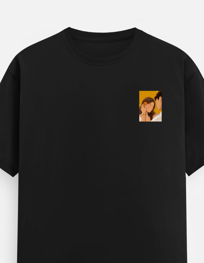 Black unisex crewneck T-shirt with small square portrait graphic on the chest