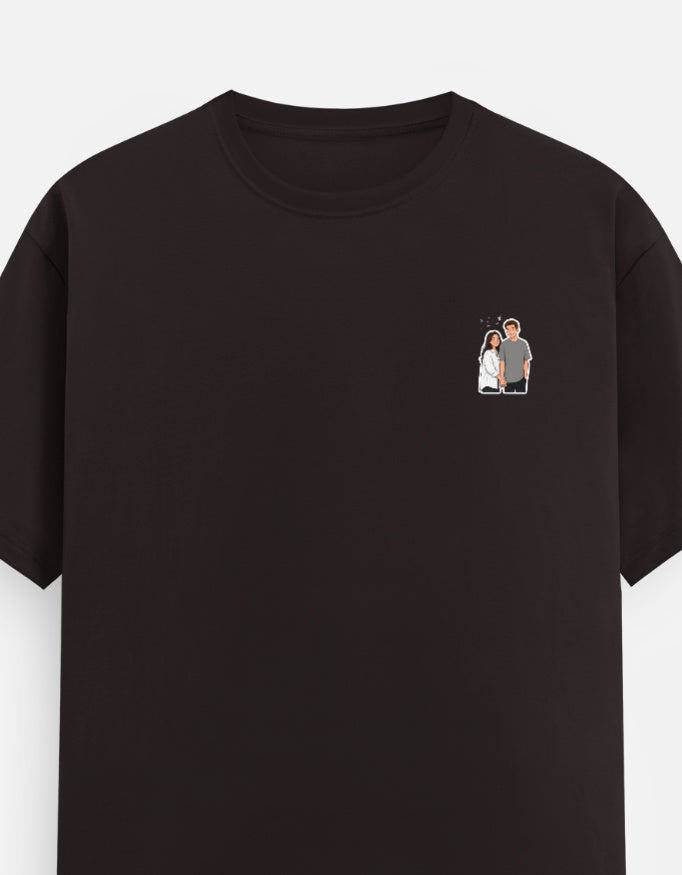 Dark brown unisex crew-neck T-shirt with short sleeves and small chest graphic.
