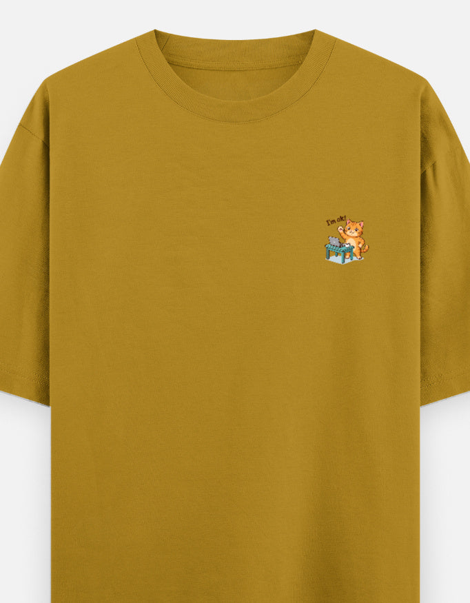 Unisex oversized round-neck T-shirt, mustard yellow, small cartoon graphic on chest