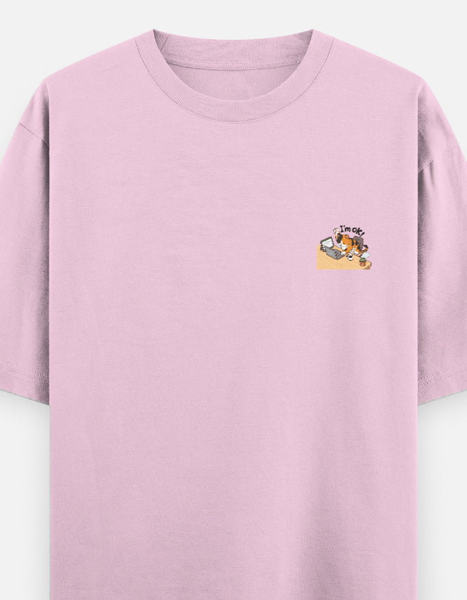 Light baby pink unisex oversized round-neck T-shirt with small chest graphic.