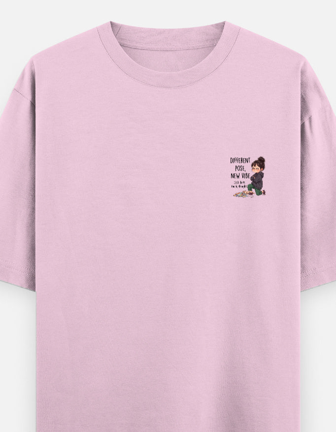 Unisex graphic oversized round-neck T-shirt in light baby pink with small chest print.