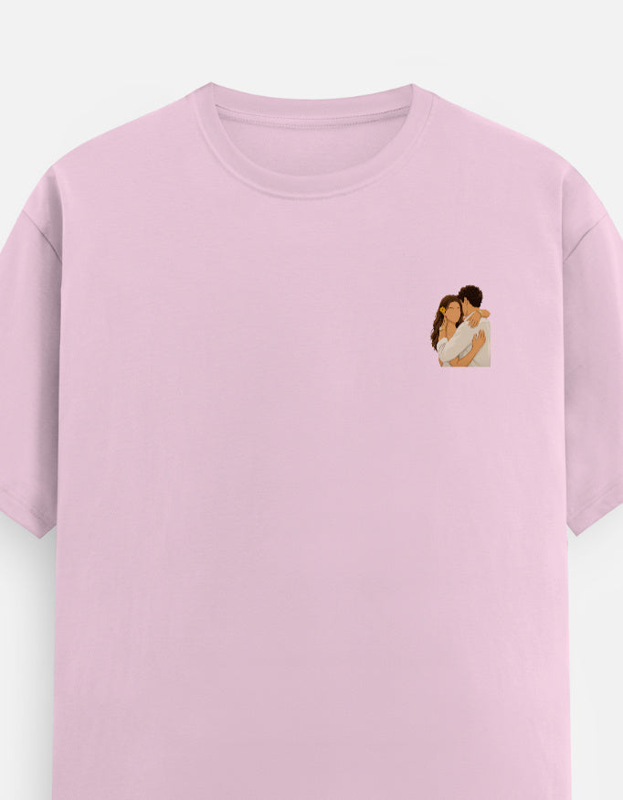 Unisex crew neck T-shirt, light baby pink, small chest graphic logo on the front.