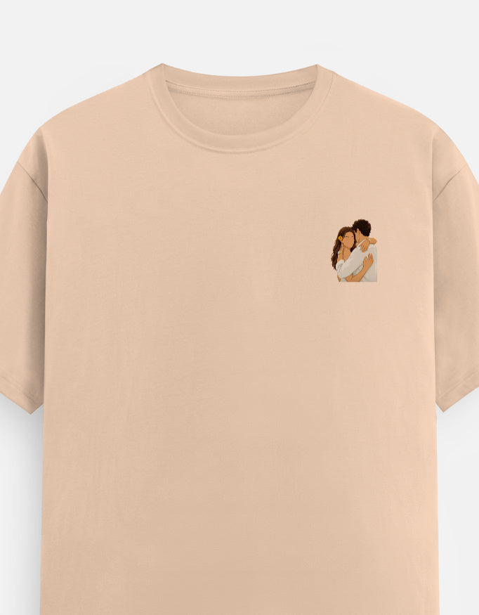 Unisex crew neck T-shirt, peach, small chest graphic logo on the front.