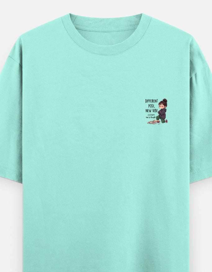 Unisex graphic oversized round-neck T-shirt in mint with small chest print.